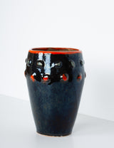 Glossy vase with red polka dots