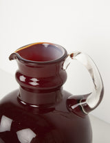 Burgundy glass pitcher