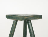 Green tripod farm stool