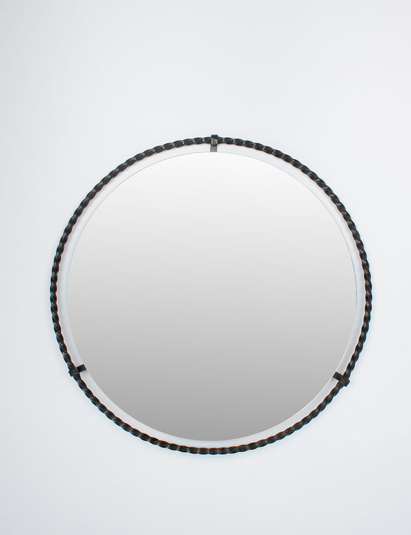 Ringed wrought-iron mirror
