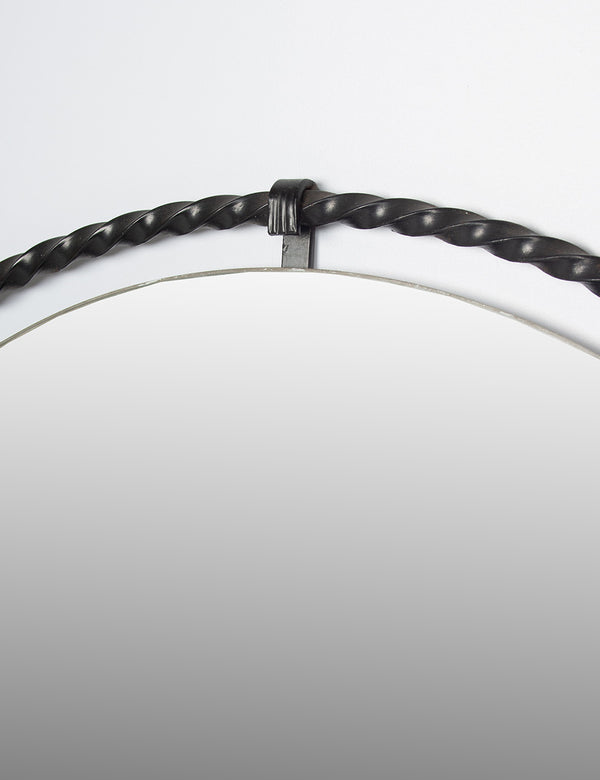 Ringed wrought-iron mirror