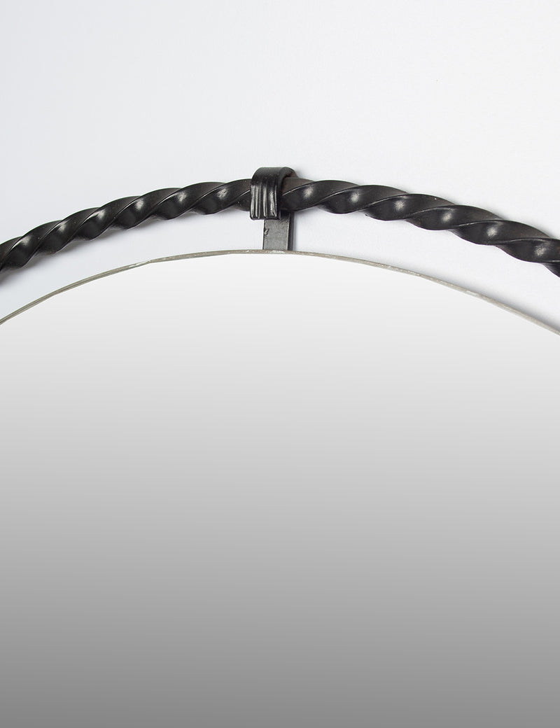 Ringed wrought-iron mirror