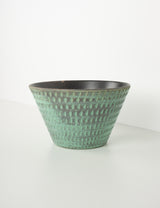 Pale green terracotta pot with notches