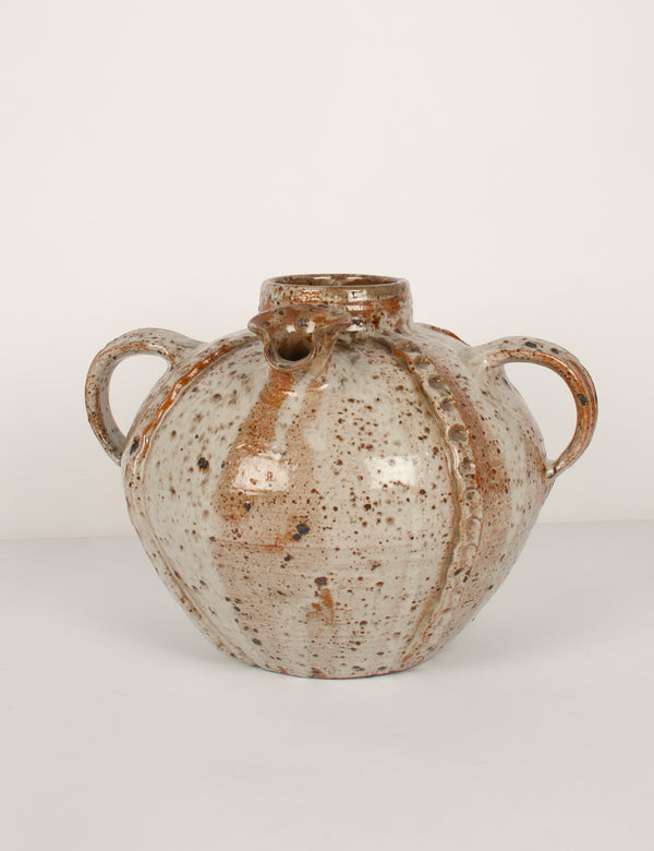 Antique large walnut oil jug