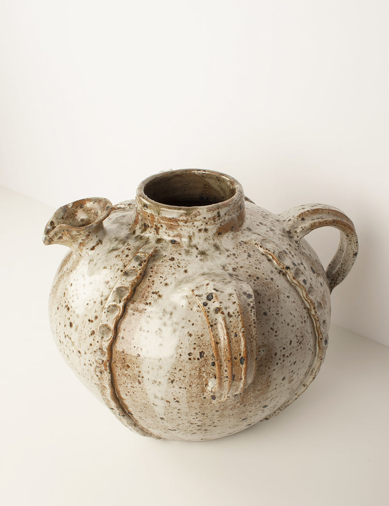 Antique large walnut oil jug