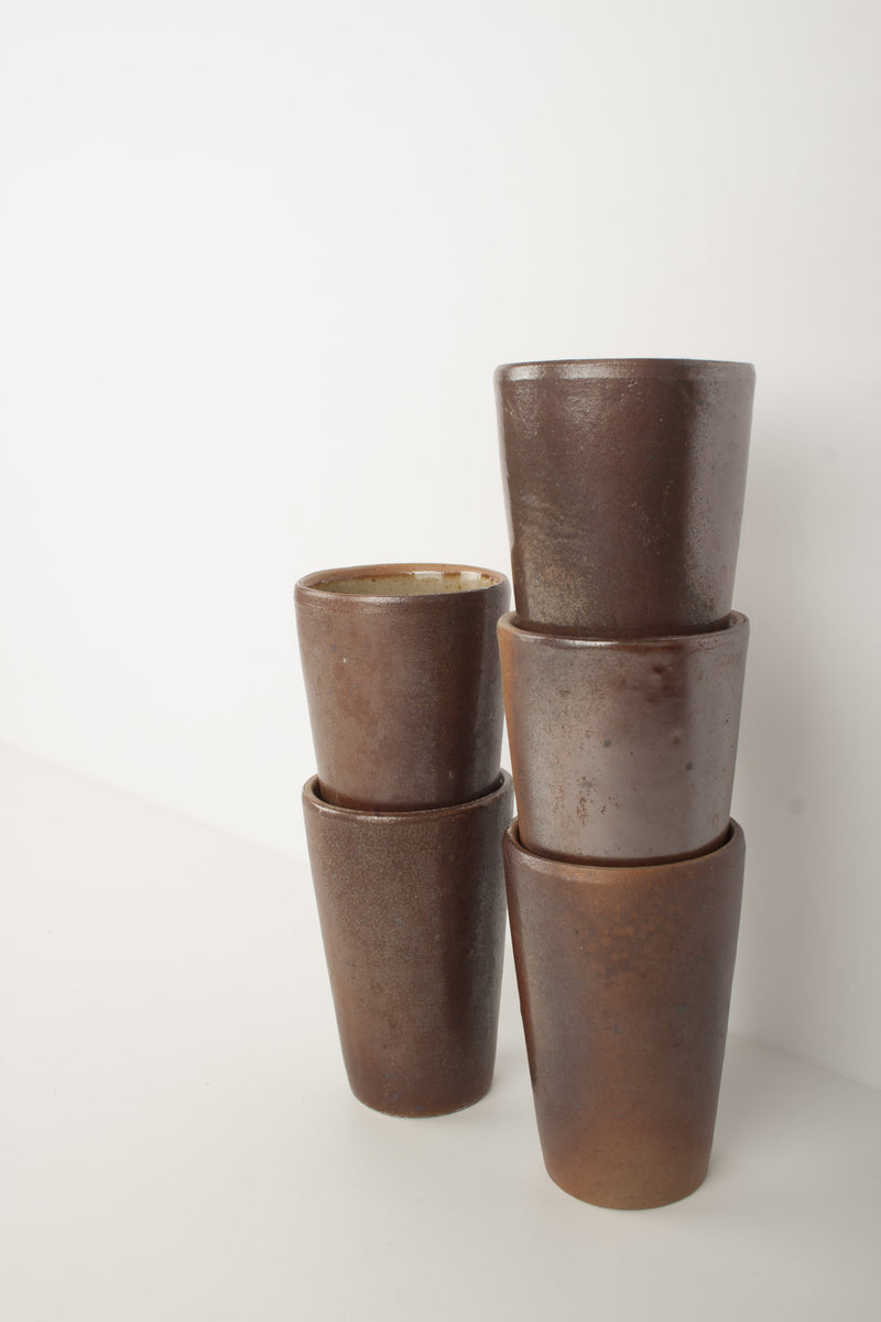 Old brown stoneware glasses