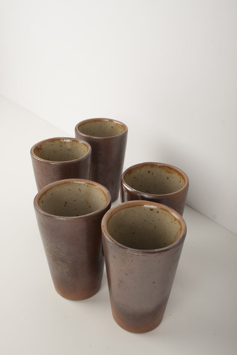 Old brown stoneware glasses