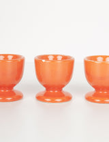 70's fluorescent orange egg cups