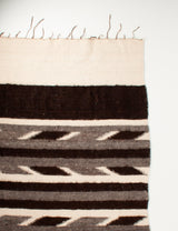 Berber blanket with geometric pattern and fringe