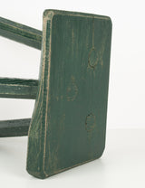 Green tripod farm stool