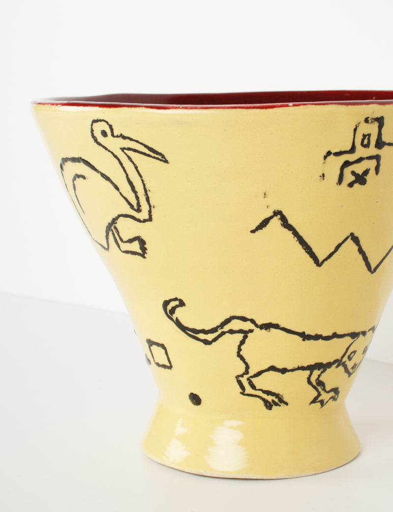 Vintage vase with primitive design